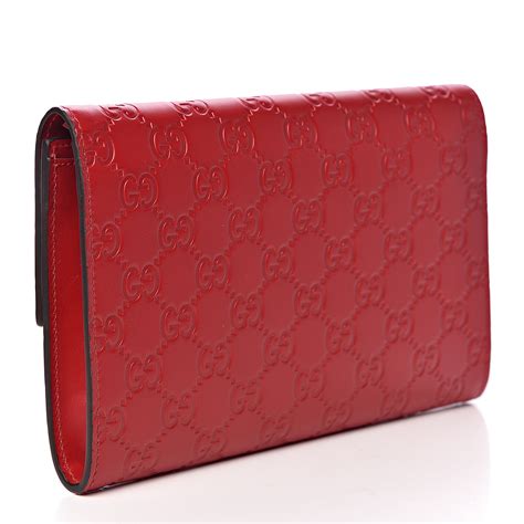 gucci red clutch|Gucci guccissima clutch.